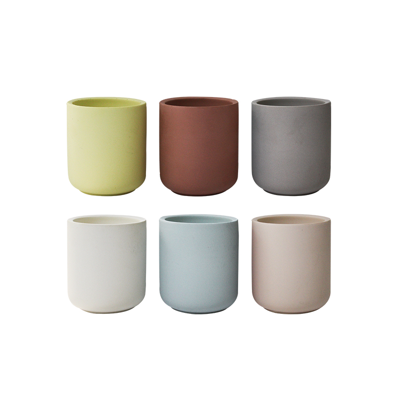 Vela de taza de aromaterapia de cerámica de seis colores.